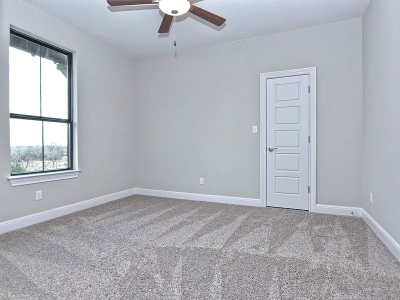 Representative unfurnished interior of a home built from the Madera II by Giddens Homes in Scofield Farms Estates, Georgetown (Image 292).