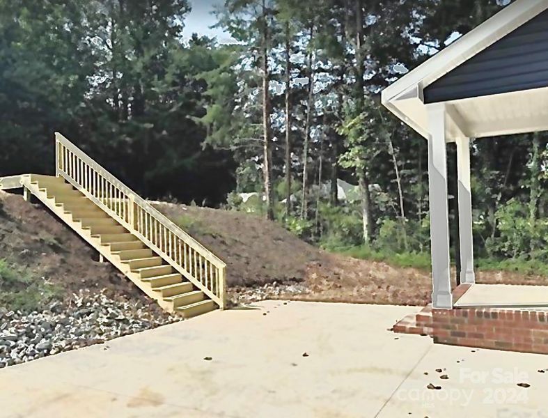 Custom staircase leads from extra parking to the front porch.