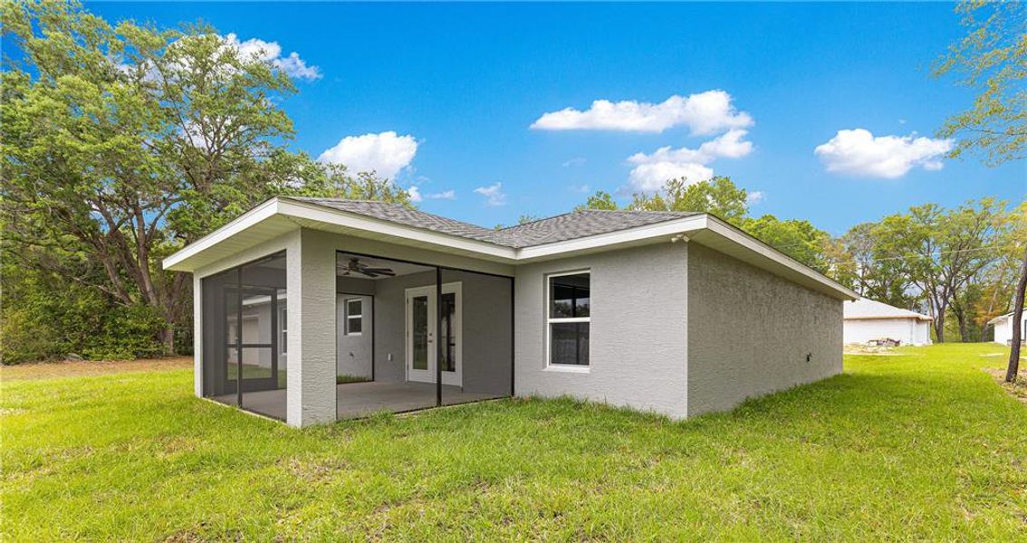 Exterior details and patio area of a home in , Summerfield (Image 20).