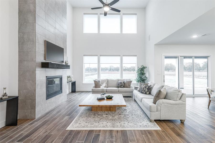 The Great Room is spectacular.  Grounding this space is the floor to ceiling tile surround fireplace and mantle. This room has surround sound.  7918 Longhorn Trail is a smart home so all your technology, climate control and home programs are at your fingertips.