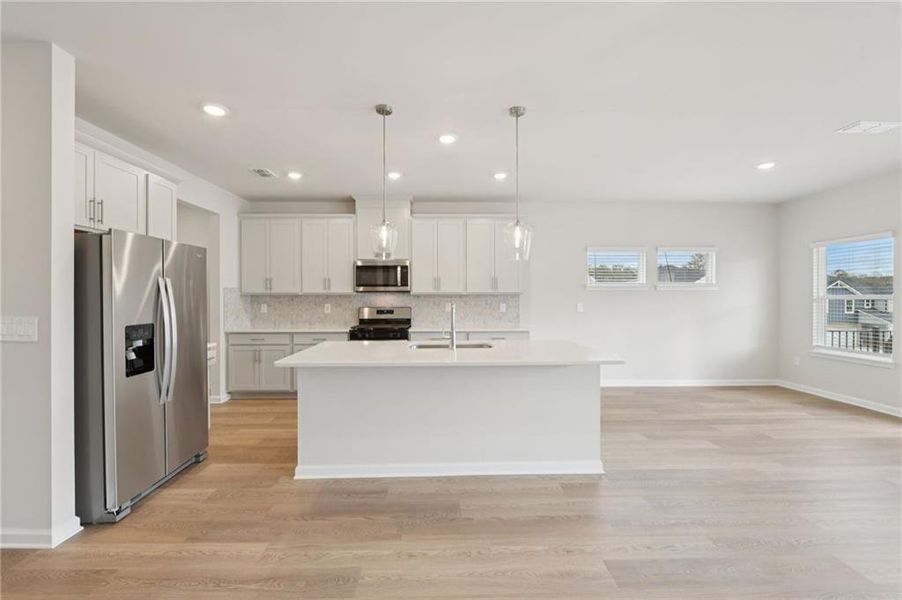 Furnished interior view inside a new home in Parkside at Grayson, Grayson (Image 7).