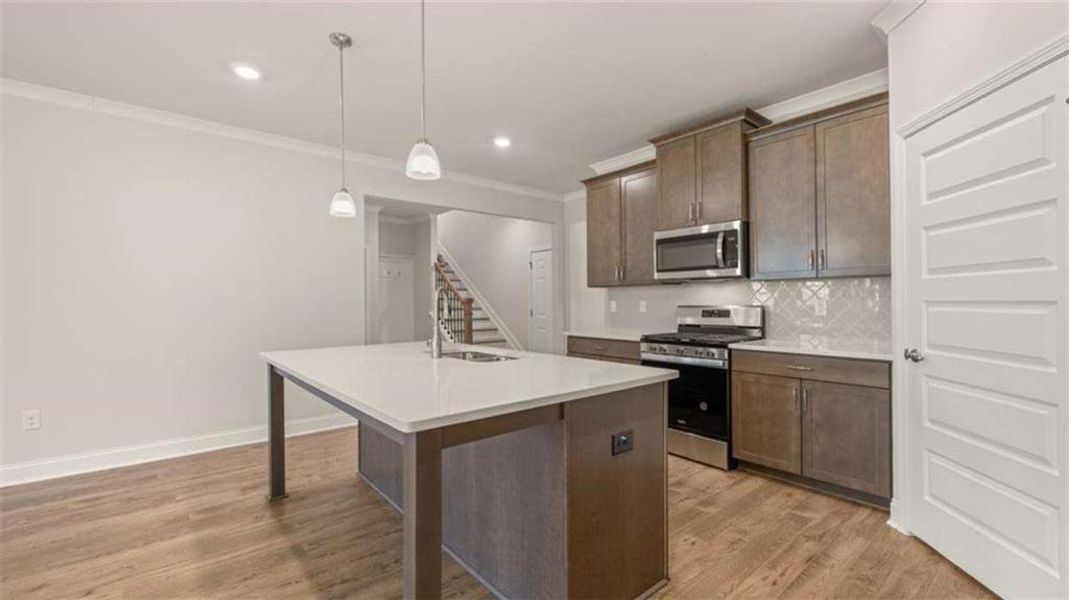 Furnished interior view inside a new home in Oak Ridge Meadows - Active Adult, Locust Grove (Image 11).