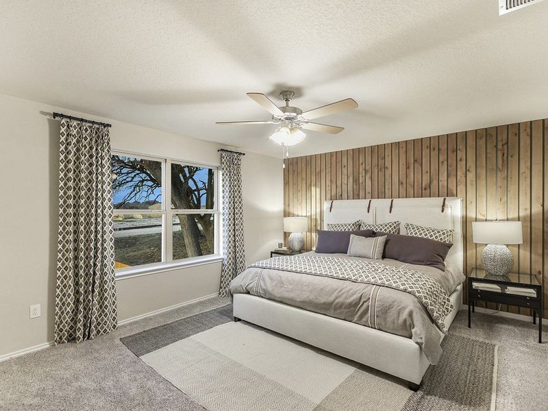 Santiago model primary suite  at Hidden Springs in New Braunfels, TX by Century Communities