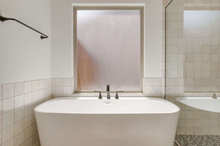 Representative furnished interior of a home built from the Longview by Graham Hart Home Builder in Bear Ridge, Burleson (Image 10).