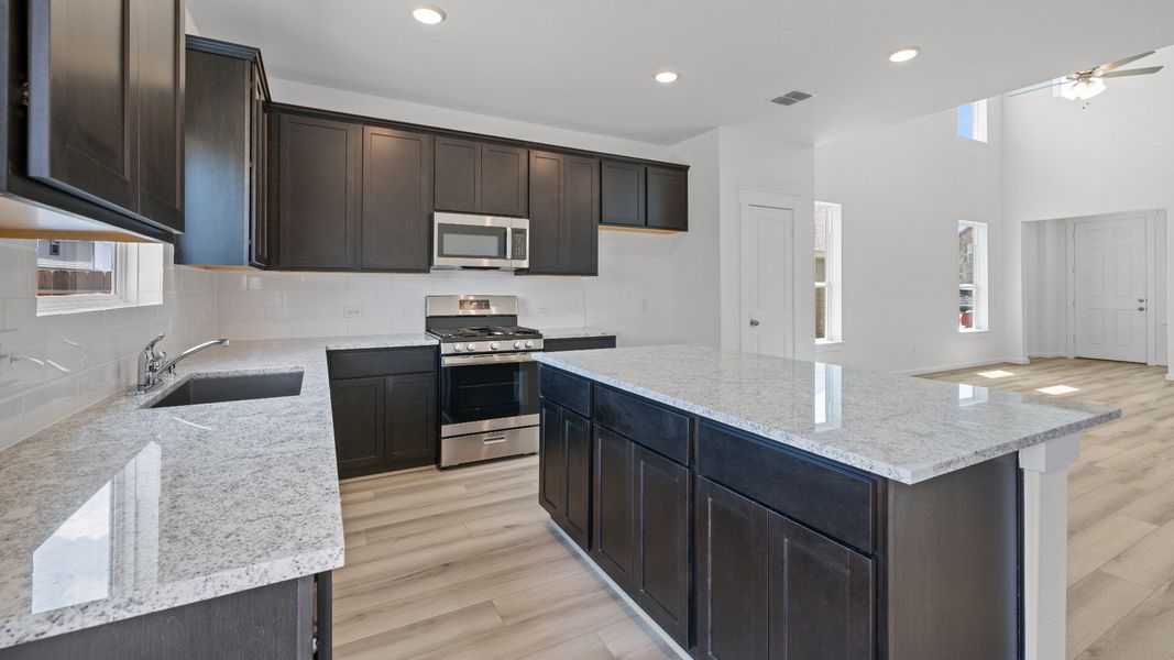 Furnished interior view inside a new home in Cielo, Conroe (Image 12).