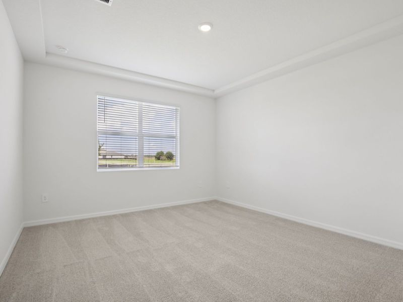 Spacious, unfurnished interior of a new home in Coasterra - Reserve Series, Palmetto (Image 12).