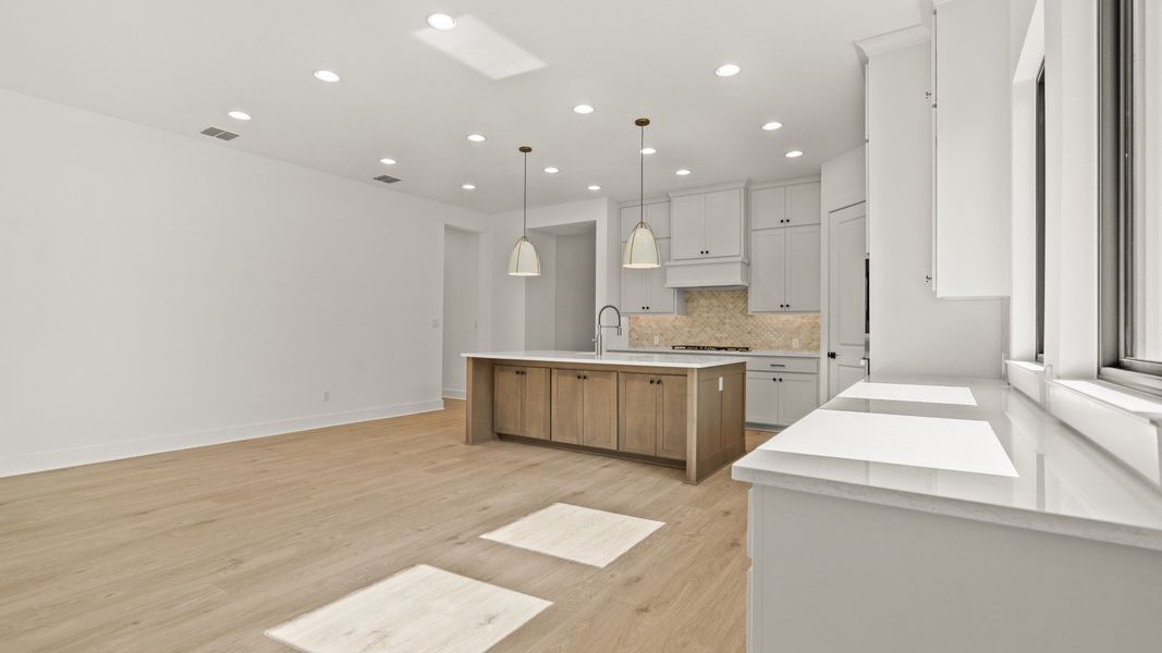 Furnished interior view inside a new home in Glynlea Country Club, Port St. Lucie (Image 6).