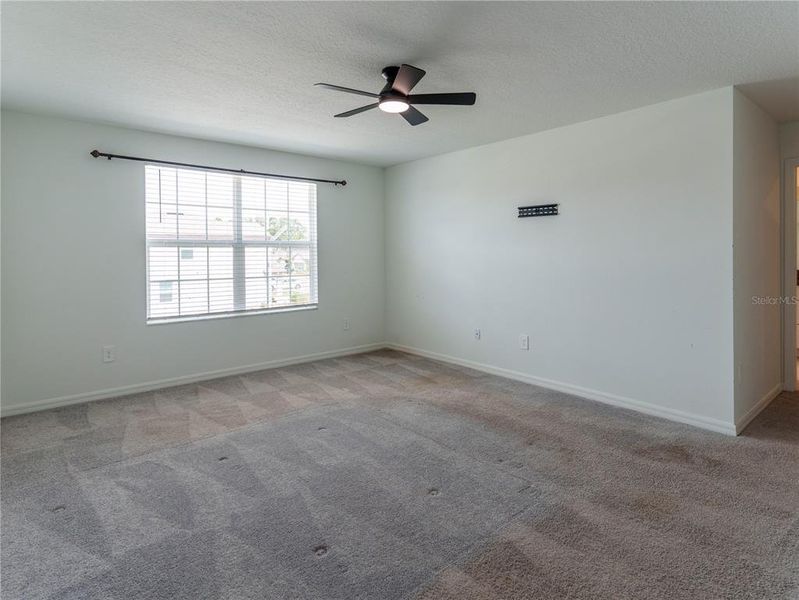 Spacious, unfurnished interior of a new home in The Isle of Avalon, Spring Hill (Image 22).