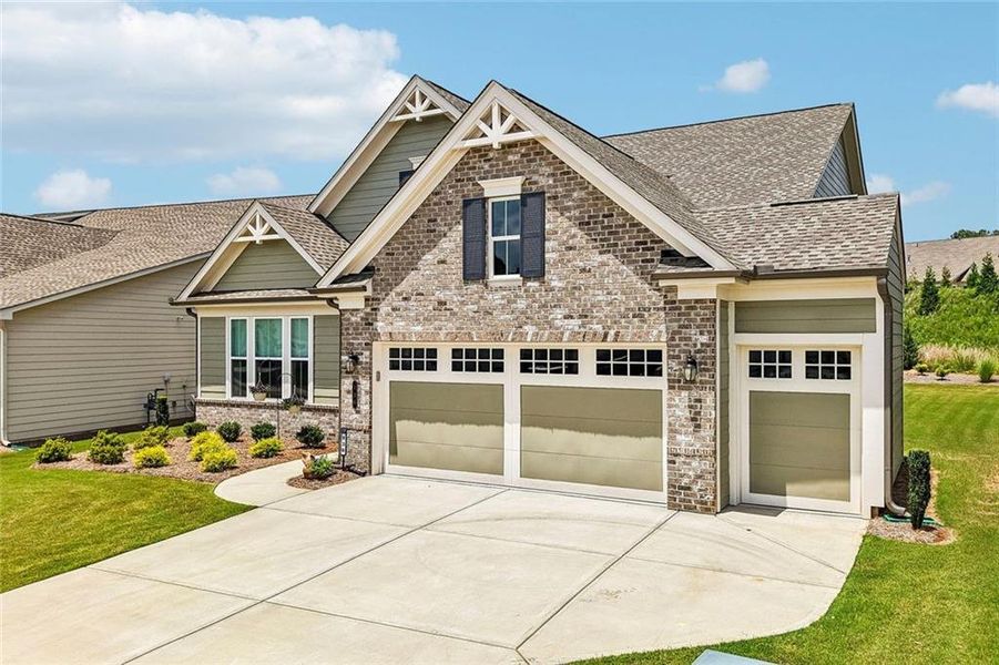 Front exterior of a new home in , Hoschton, GA, highlighting curb appeal (Image 1). Front exterior of a new home in , Hoschton, GA, highlighting curb appeal (Image 1).