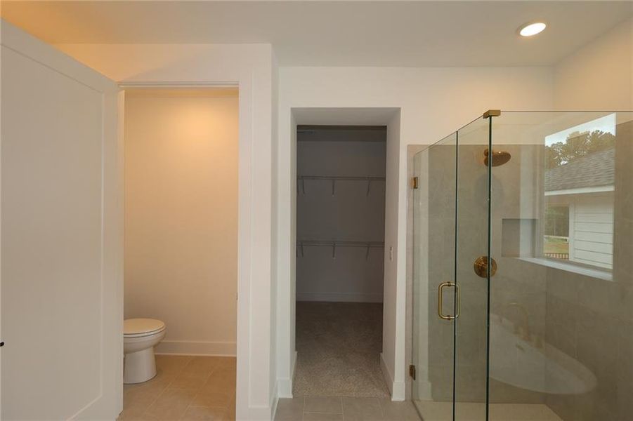 Furnished interior view inside a new home in Maple Grove at Towne Lake, Woodstock (Image 7).