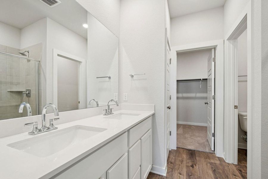 Furnished interior view inside a new home in Stallion Run, Buda (Image 10).