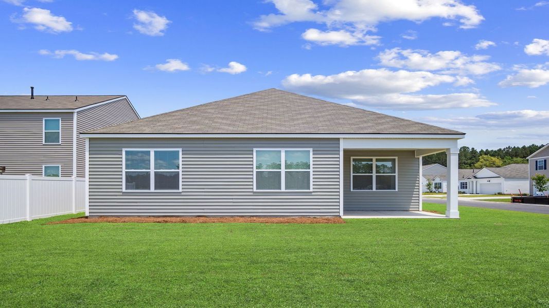 Front exterior of a new home in The Retreat at East Argent, Ridgeland, SC, highlighting curb appeal (Image 26).