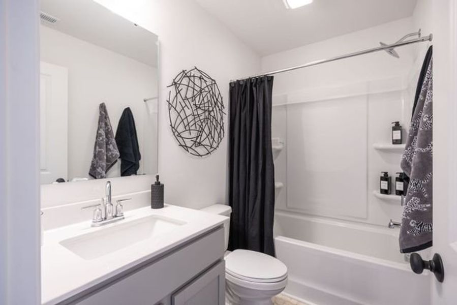 Representative furnished interior of a home built from the Myka TH by True Homes in Village at Reedy Creek Townhomes, Charlotte (Image 16).