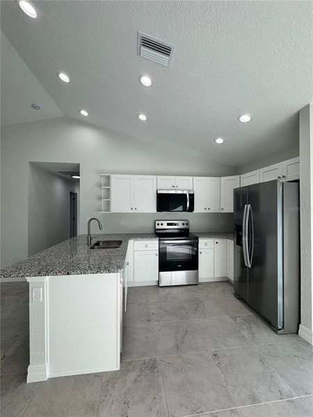 Furnished interior view inside a new home in , Port Charlotte (Image 5).
