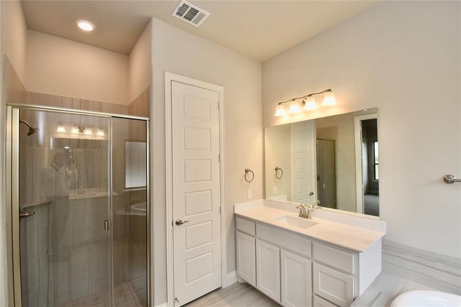 Furnished interior in a model home at Stone Henge II in Sanger (Image 15).