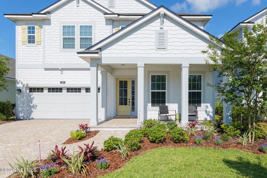 Front exterior of a new home in Seabrook Village at Seabrook, Ponte Vedra, FL, highlighting curb appeal (Image 30).