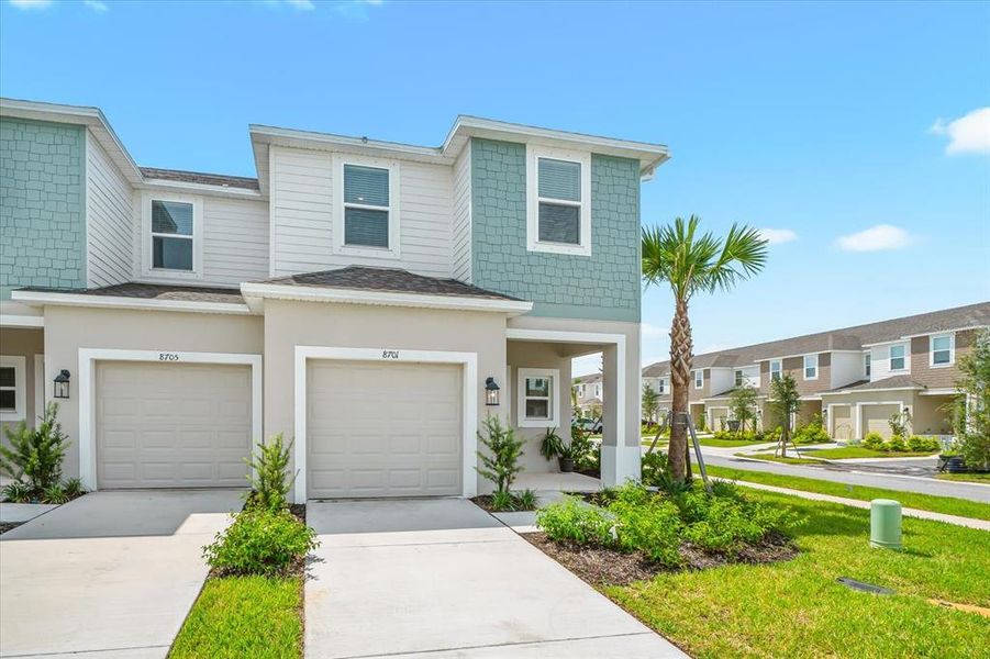 Front exterior of a new home in , Sarasota, FL, highlighting curb appeal (Image 25). Front exterior of a new home in , Sarasota, FL, highlighting curb appeal (Image 25).