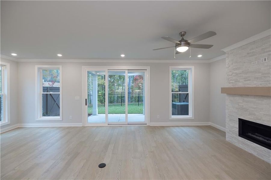 Triple slider doors! *Please note photos shown are of the Ellington plan but not of the actual home.