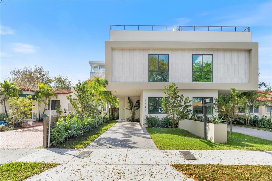 Front exterior of a new home in , Miami, FL, highlighting curb appeal (Image 2). Front exterior of a new home in , Miami, FL, highlighting curb appeal (Image 2).