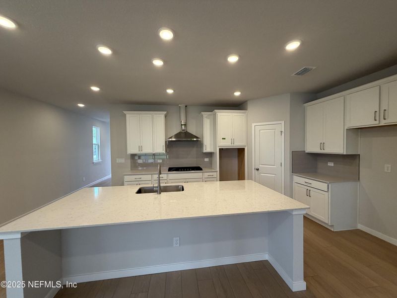 Furnished interior view inside a new home in The Magnolia Series at Reserve East, Flagler Beach (Image 8).