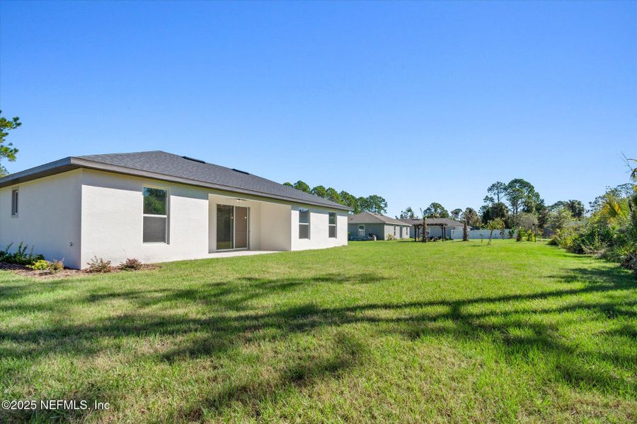 Exterior details and patio area of a home in , Palm Coast (Image 15). Exterior details and patio area of a home in , Palm Coast (Image 15).