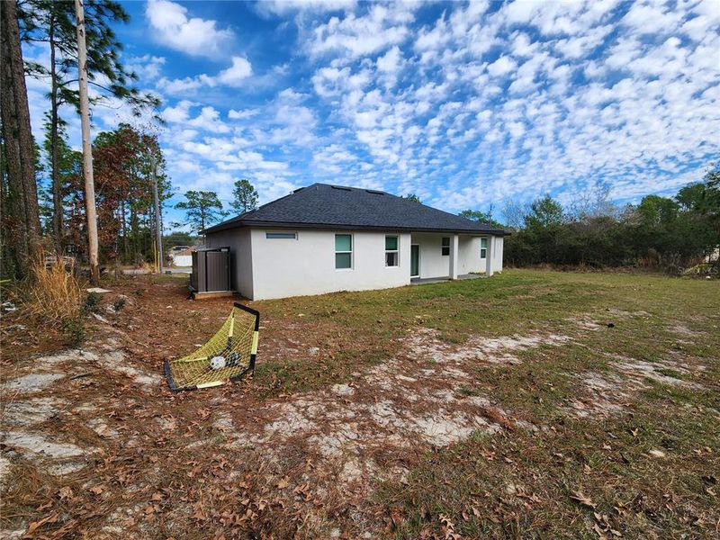 Exterior details and patio area of a home in , Ocala (Image 36).