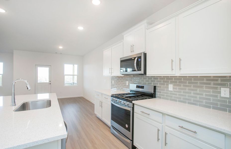 Homesite 96 Kitchen with Island in new home construction by Pulte Homes Nashville