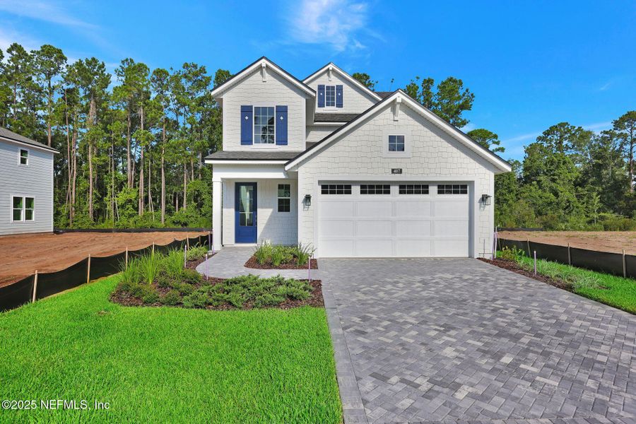 Front exterior of a new home in Reflections at Nocatee, Nocatee, FL, highlighting curb appeal (Image 24).