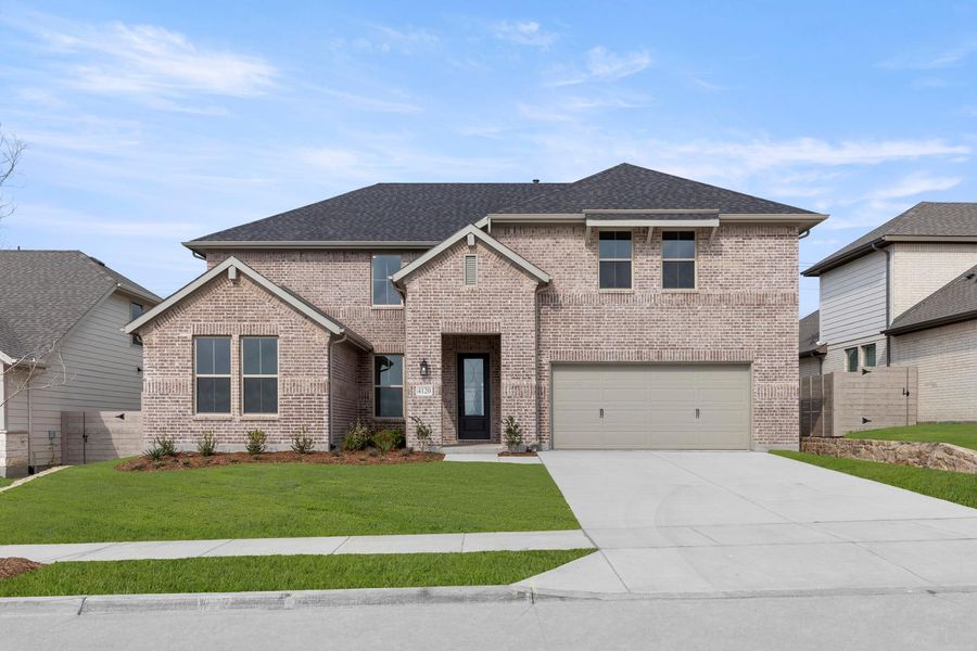 Front exterior of a new home in Painted Tree, McKinney, TX, highlighting curb appeal (Image 1). Front exterior of a new home in Painted Tree, McKinney, TX, highlighting curb appeal (Image 1).