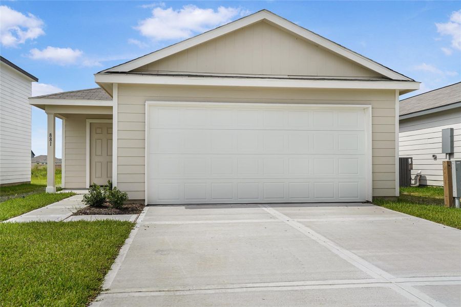 Front exterior of a new home in Santa Fe, Cleveland, TX, highlighting curb appeal (Image 2). Front exterior of a new home in Santa Fe, Cleveland, TX, highlighting curb appeal (Image 2).