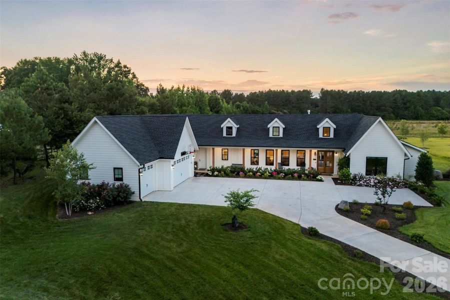Front exterior of a new home in , Rock Hill, SC, highlighting curb appeal (Image 25).