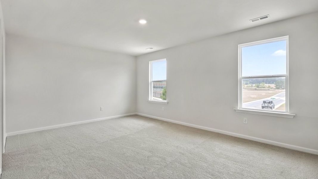 Representative unfurnished interior of a home built from the Robie by D.R. Horton in The Grove at Matthews Landing, Fuquay Varina (Image 21).