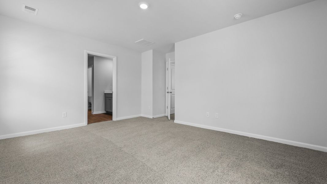 Representative unfurnished interior of a home built from the Aisle by D.R. Horton in Pine Hills at Cane Bay, Summerville (Image 29).