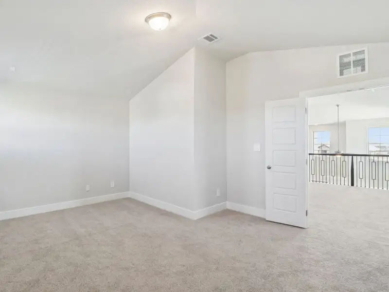 Spacious, unfurnished interior of a new home in Legendary Trails - Premier Series, Cibolo (Image 27).