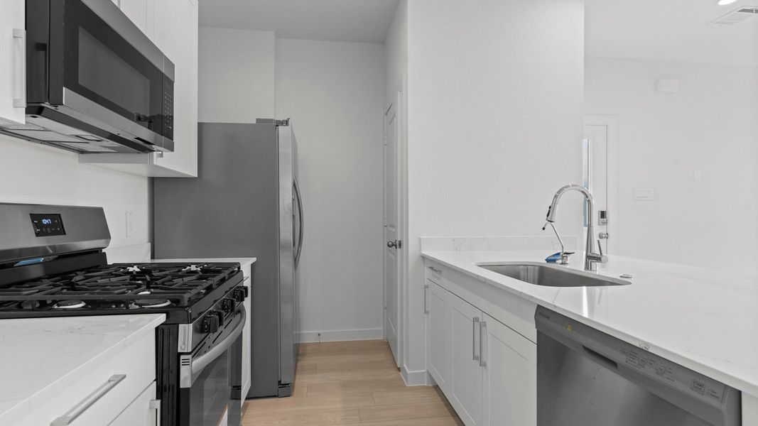 Furnished interior view inside a new home in Lexington Village, Missouri City (Image 10).