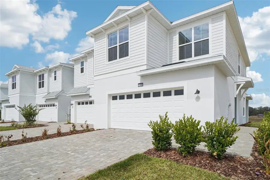 Front exterior of a new home in , San Antonio, FL, highlighting curb appeal (Image 1). Front exterior of a new home in , San Antonio, FL, highlighting curb appeal (Image 1).