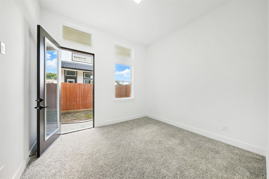 3rd bedroom has access to the side yard