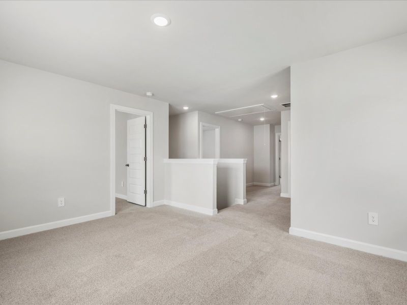 Spacious, unfurnished interior of a new home in Waterside - Boardwalk Series, Longs (Image 18).