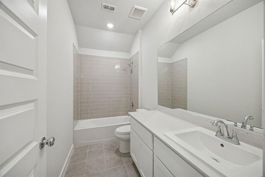 Bathroom in the Wimbledon home plan by Trophy Signature Homes – REPRESENTATIVE PHOTO Bathroom in the Wimbledon home plan by Trophy Signature Homes – REPRESENTATIVE PHOTO