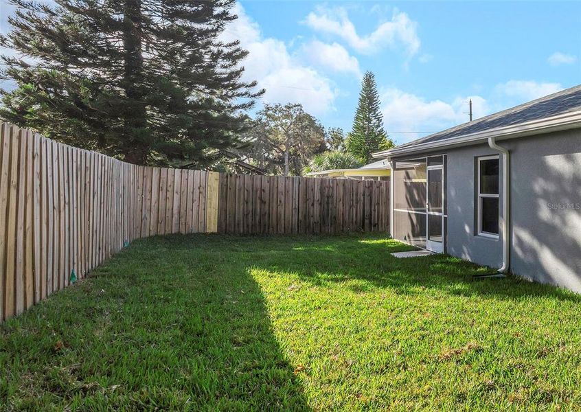 Exterior details and patio area of a home in , New Port Richey (Image 22).