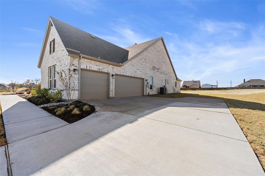 Front exterior of a new home in Creekview Addition, Van Alstyne, TX, highlighting curb appeal (Image 22).