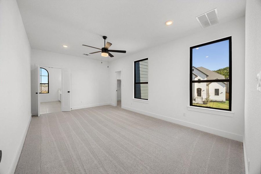 Spacious, unfurnished interior of a new home in Palmera Ridge: 80ft. lots, Leander (Image 25).