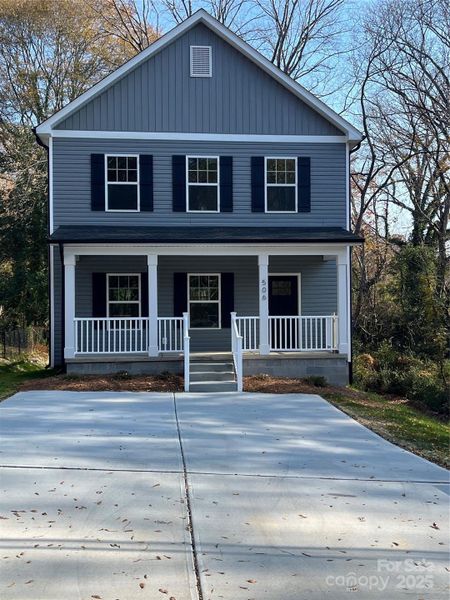 Front exterior of a new home in , Gastonia, NC, highlighting curb appeal (Image 15).