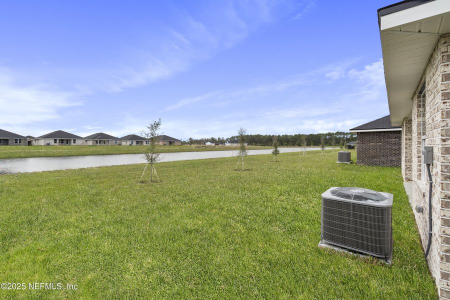 Exterior details and patio area of a home in Shadow Crest at Rolling Hills, Green Cove Springs (Image 2). Exterior details and patio area of a home in Shadow Crest at Rolling Hills, Green Cove Springs (Image 2).