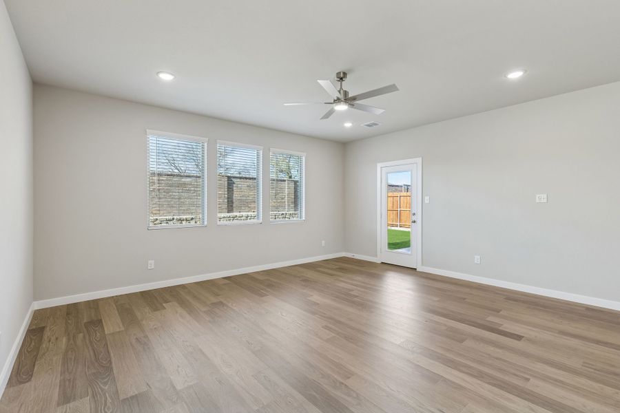 Living Room in the Holden home plan by Trophy Signature Homes – REPRESENTATIVE PHOTO Living Room in the Holden home plan by Trophy Signature Homes – REPRESENTATIVE PHOTO