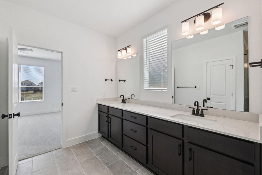 Furnished interior view inside a new home in Lariat, Liberty Hill (Image 13). Furnished interior view inside a new home in Lariat, Liberty Hill (Image 13).