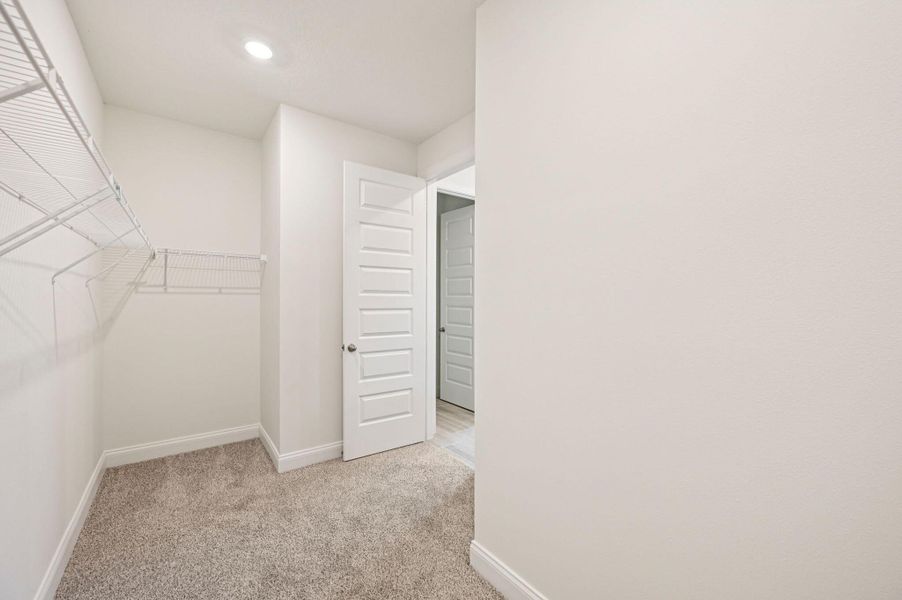 Spacious, unfurnished interior of a new home in Hampton Park - Signature Series, Vero Beach (Image 23).