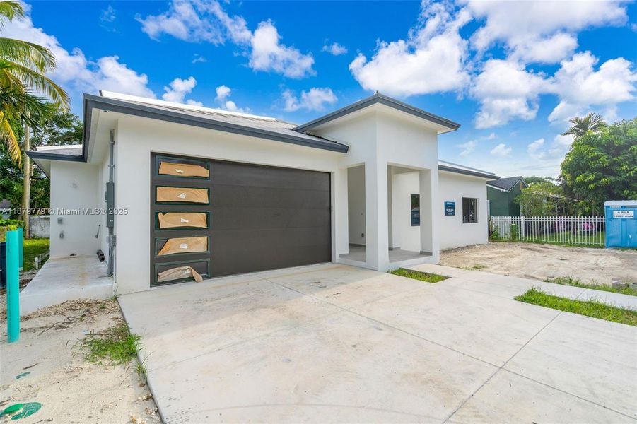 Exterior details and patio area of a home in , Miami (Image 3).
