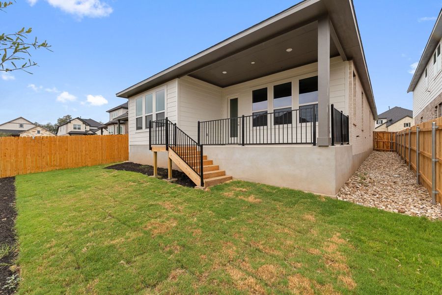 Exterior details and patio area of a home in Heritage, Dripping Springs (Image 4).