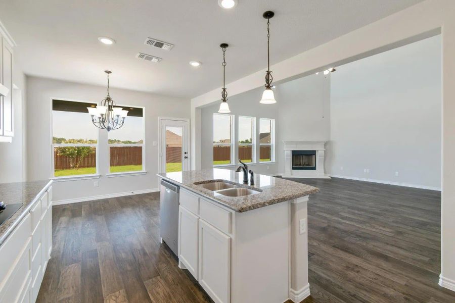 Kitchen & Family Room | Concept 3115 at Massey Meadows in Midlothian, TX by Landsea Homes